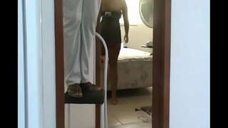 The woman in the Corner was Showing without panties on to Electrician